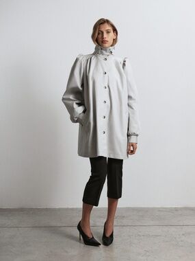 Raincoat with stole and accent lining